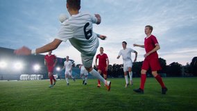 Soccer Player Receives Successful Pass and Kicks Ball and Scores Amazing Goal doing Doing Verticle Bicycle Kick. In Slow Motion. - Powered by Shutterstock - Get 15% off with code: PIKWIZARD15