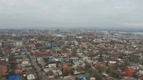 Aerial drone shot of Dnipro cityscape and skyline. Flying over roofs of buildings. 4k footage. (Dnepr, Dnepropetrovsk, Dnipropetrovsk). Ukraine
