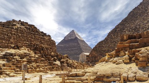 Time lapse with clouds over great pyramids at Giza Cairo in Egypt - Zoom In of Stone Pyramid