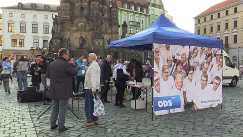 OLOMOUC, CZECH REPUBLIC, SEPTEMBER 2, 2018: The pre-election meeting of the Civic Democratic Party of ODS on square, people receive free-of-charge wine and sweets, discussing politics, policy election