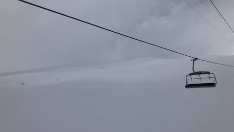 sunny day winter time gudauri ski resort lift ride panorama 4k georgia