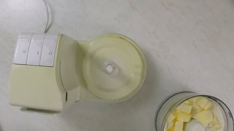 Combine butter and flour in  food processor. Making dough in  food processor. Making Lemon Mascarpone Pie Series.