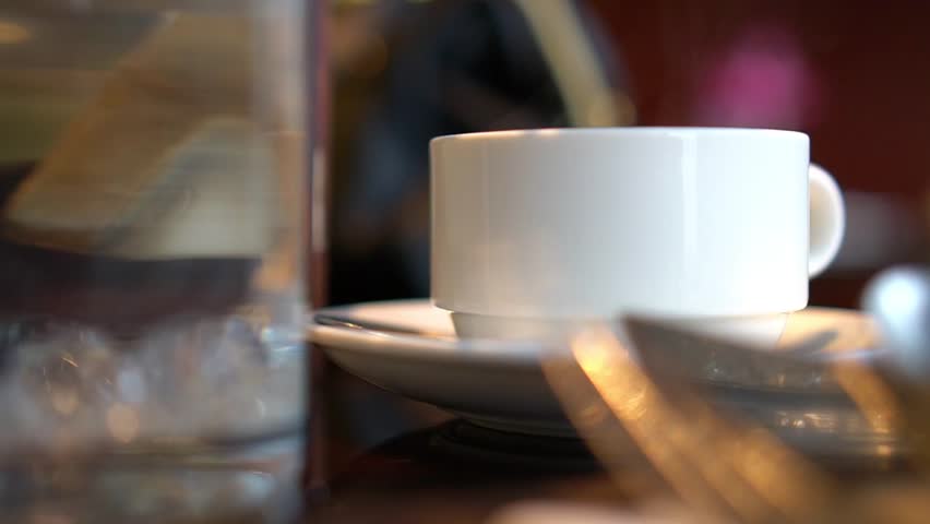 Hot coffee or chocolate in a restaurant | Shutterstock HD Video #1019594035