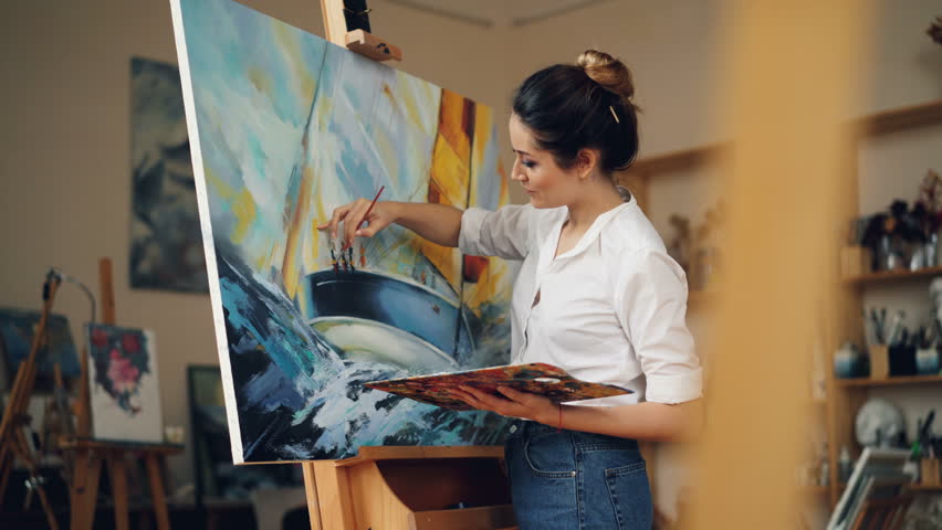 skillful female painter working studio alone Stock Footage Video (100%