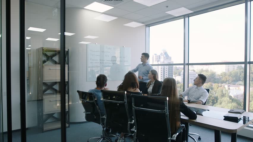 Group of people working in the office. Teamwork | Shutterstock HD Video #1019620093