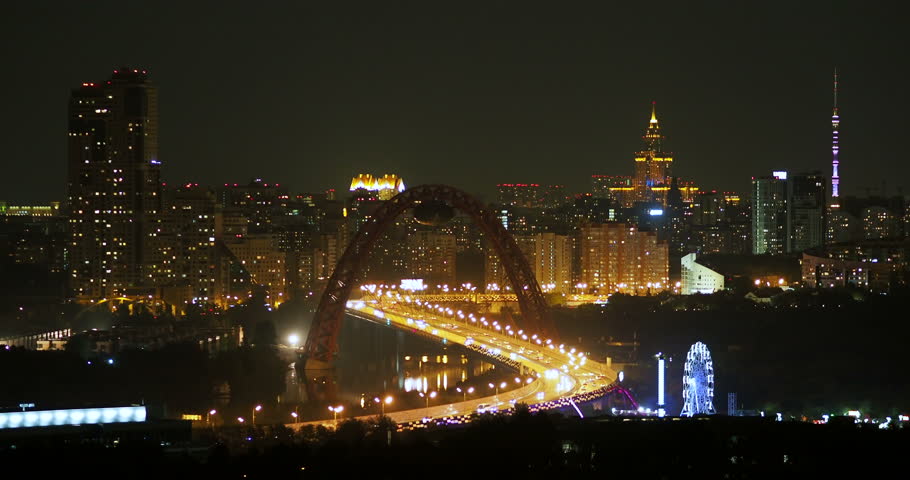 Night panorama view of Moscow, Russia. Architectural landmarks - Jivopisniy bridge, Stalin skyscraper, Ostankino Tower.