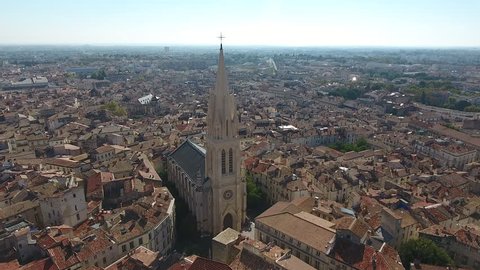 Zoom out over Montpellier Sainte Anne church sunny day aerial view