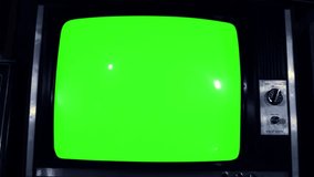 Old Green Screen TV among Many Old Televisions. Dolly Out. Night Tone. You can Replace Green Screen with the Footage or Picture you Want with “Keying” effect (check out tutorials).  