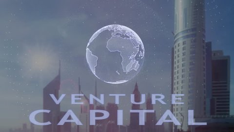 Venture Capital text with 3d hologram of the planet Earth against the backdrop of the modern metropolis. Futuristic animation concept