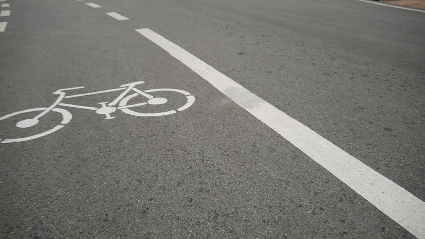 Bike icon on the way. Street in the park for bike exercising | Shutterstock HD Video #1019639863
