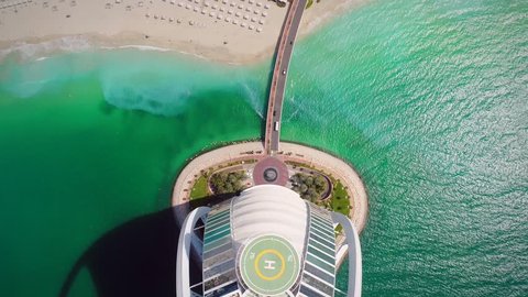 DUBAI, U.A.E - MAY 5 2018: Aerial view of road going towards luxurious Burj Al Arab Hotel in the bay of Dubai.