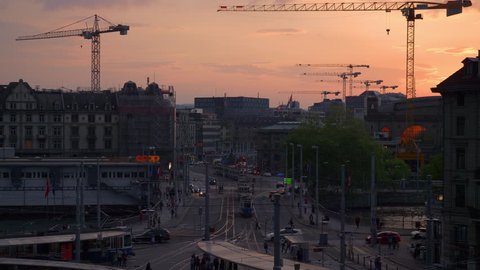 ZURICH, SWITZERLAND - MAY 22 2018: sunset sky zurich city central train station traffic square panorama 4k circa may 22 2018 zurich, switzerland.