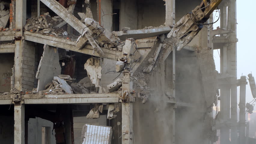 demolition of a multi-storey building with hydraulic shears, for future development of residential buildings
 Royalty-Free Stock Footage #1019649658