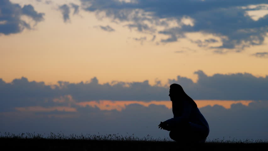 Baby walks to mother, rise up and spinning, sunset silhouettes