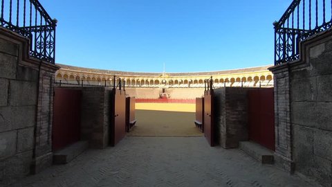 SEVILLE, SPAIN - CIRCA JUNE, 2018: POV Entering the Real Maestranza of Cavalry Bullring interior view, one of the biggest arenas of Spain for bullfights.