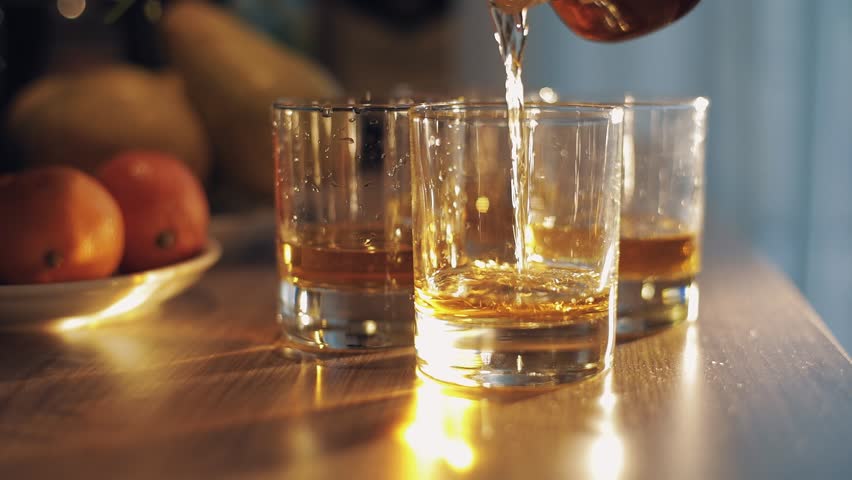Pouring Cold whiskey into glass