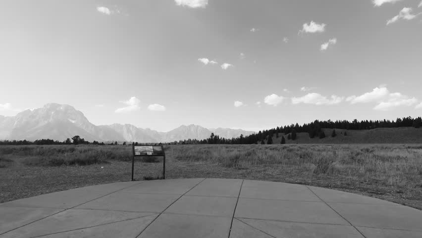 Driving in Yellowstone park, siteviewing, peaceful, sunny, Point of View - Mounted 2.7k Ultra HD footage