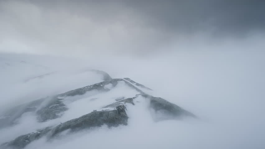 Blizzard Over Antarctica Mountains. Aerial Time Lapse Over South Pole. Harsh Wild Environment. Natural Polar Phenomena in Antarctic Midsummer. Winter Landscape In Grey White Tints. 4k Footage. | Shutterstock HD Video #1019710753