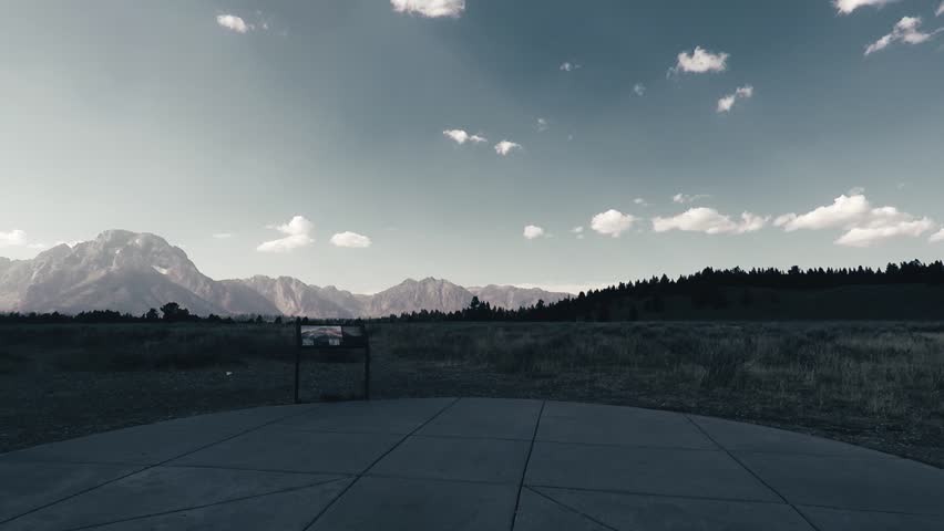 Driving in Yellowstone park, siteviewing, peaceful, sunny, Point of View - Mounted 2.7k Ultra HD footage