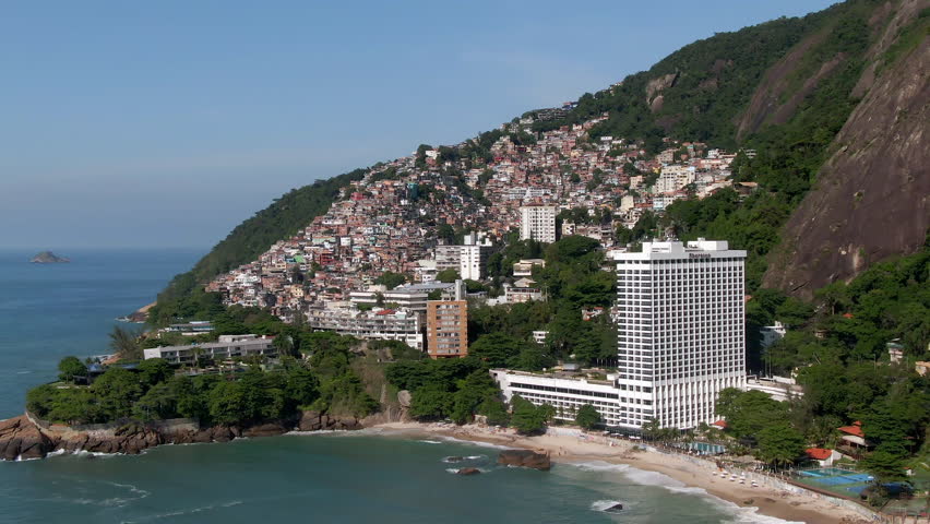 Aerial view of Rio de Janeiro, Brazil, showing favela Vidigal and Two Brothers mountain on a sunny day. 