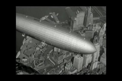 New York , United States of America.  About 1936. The Hindenburg Zeppelin flies over the city of New York