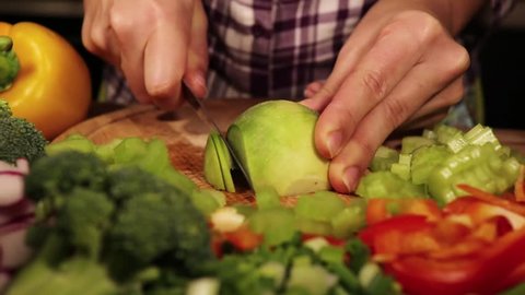 woman cut turnip on a chopping Board, preparation of vegetable salad, healthy food
