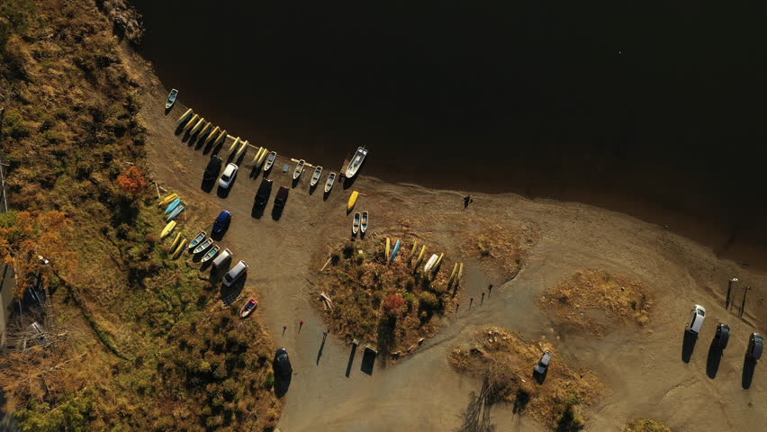 Aerial view of boats and vehicle parked at Lake Motosu shore, Yamanashi Prefecture, Japan