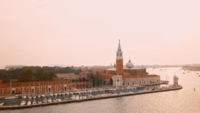 Drone video - Venice Cityscape Aerial View Grand Canal San Marco Bell Tower Mark Square St Mark's square and Santa Maria della Salute church Italy. Professional color grade 4K UHD footage PART 4