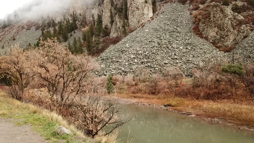 Upward shot of mountains and fog near Penny Hot Springs, Colorado