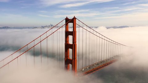 San Francisco Golden Gate Bridge Poking Through Fog - Aerial View / Flyover From Helicopter 