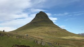 Time lapse video of Kirkjufell mountains lightning on sunny day, north coast of Iceland