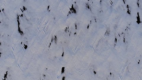 Aerial vertical shot of deserted icy field
