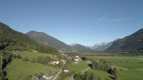 Austria Mountains Aerial Farming Community village and Pine Trees