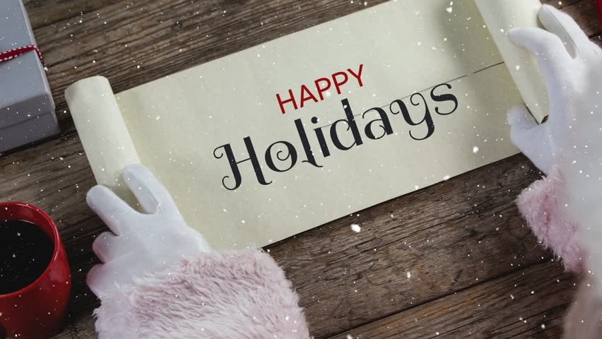 Digital composite of Video composition with snow over desk  with santa  revealing paper roll