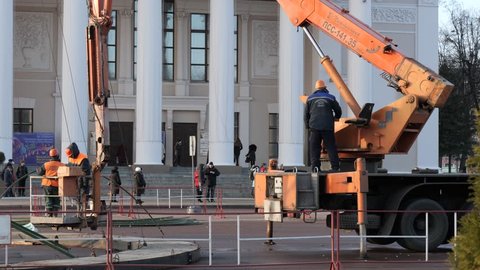 GOMEL, BELARUS - NOVEMBER 18, 2018: Installation of a New Year tree on Lenin Square.