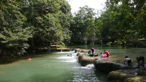 SARABURI, THAILAND - NOVEMBER 13 : Thai people and travelers foreigner travel relax and play swimming in Namtok Chet Sao Noi small waterfall at National Park on November 13, 2018 in Saraburi, Thailand