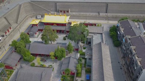 Aerial view over Guangren Temple inside Xi'an ancient city. Temple surrounded by walls. Xian, China
