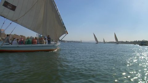 Luxor/ Egypt-10102018:Traditional felucca boats sailing on Nile river near Luxor / Egypt