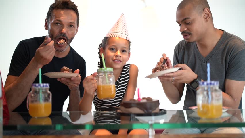 Modern Family - Gay Couple with Adopted Children - celebrating birthday party - Portrait