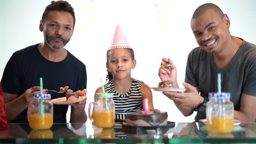 Modern Family - Gay Couple with Adopted Children - celebrating birthday party - Portrait