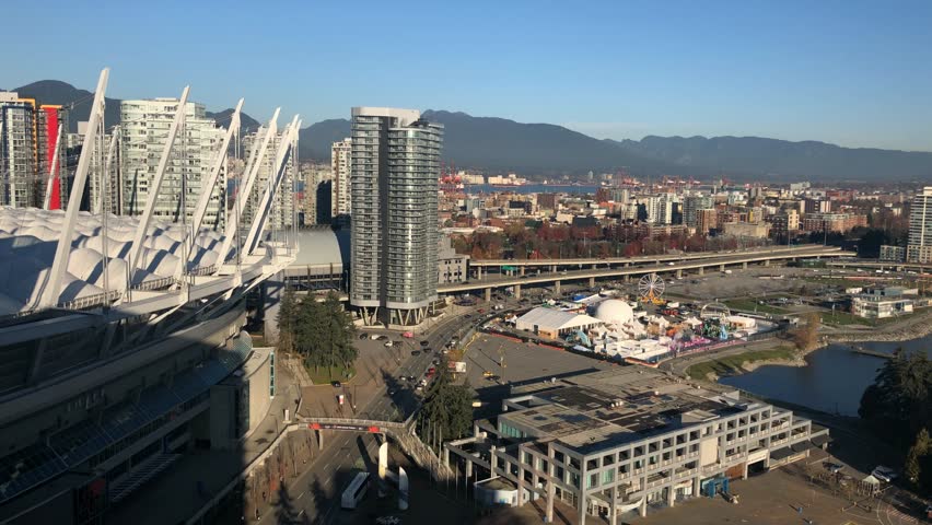False Creek Olympic village disctrict roads skyscrapers water mountains