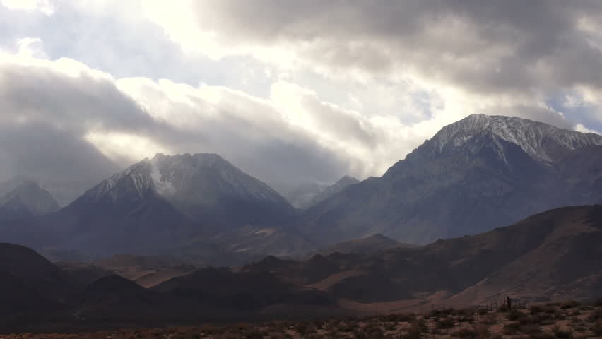 Soft White Clouds Pass By High Peak Sierra Nevada Range