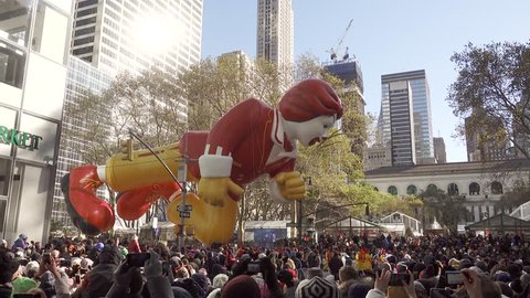 NEW YORK, USA - NOV 22, 2018 Macy's Thanksgiving day Parade, Ronald Mcdonald balloon passing Bryant Park on 6th Avenue, RX100v 4K footage