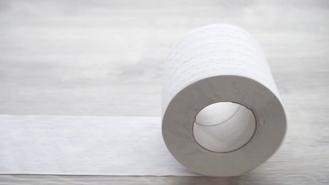 Concept idea toilet paper with perforation rolls close up,slow mo