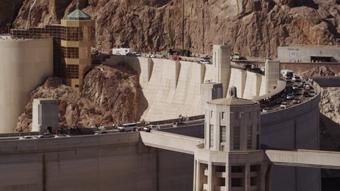Motorist and heavy traffic cross over the Hoover Dam