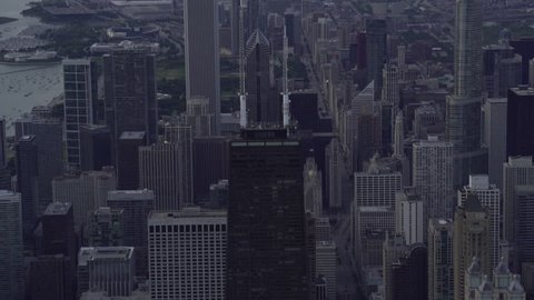 Chicago, Illinois - Circa-2015: Telephoto aerial view of the John Hancock Center featuring the Chicago Loop skyline in the background