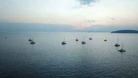 aerial footage drone flying over yacht ships in sea beautiful seaside during sunset horizon Thailand Krabi Ao Nang 4k video