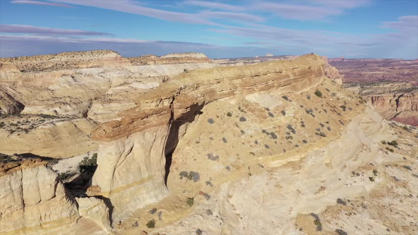 Aerial footage of buttes in the Utah desert