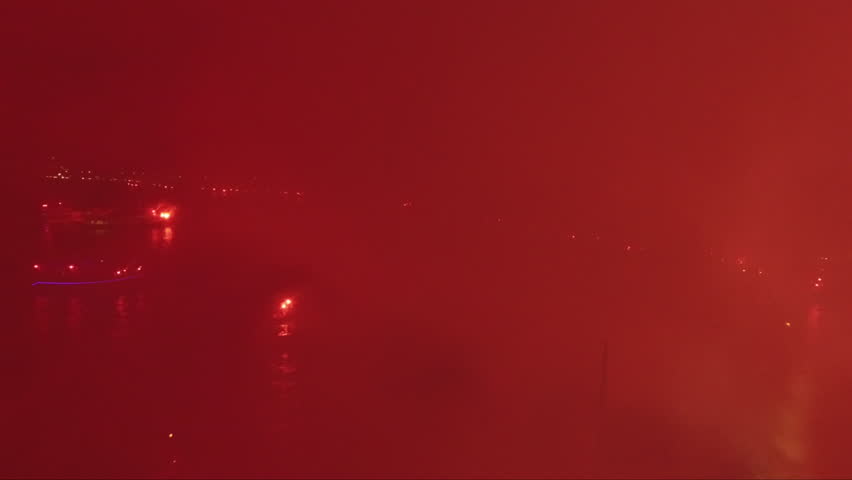 celebration by burning torch by the sea