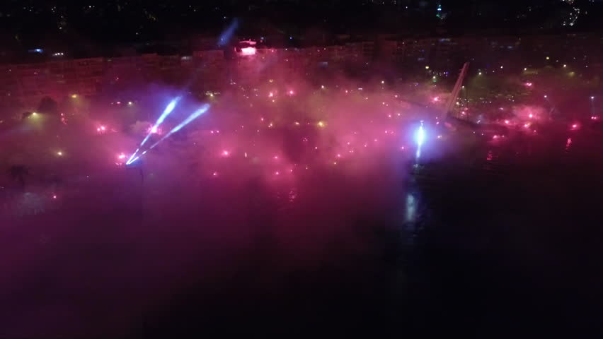 celebration by burning torch by the sea